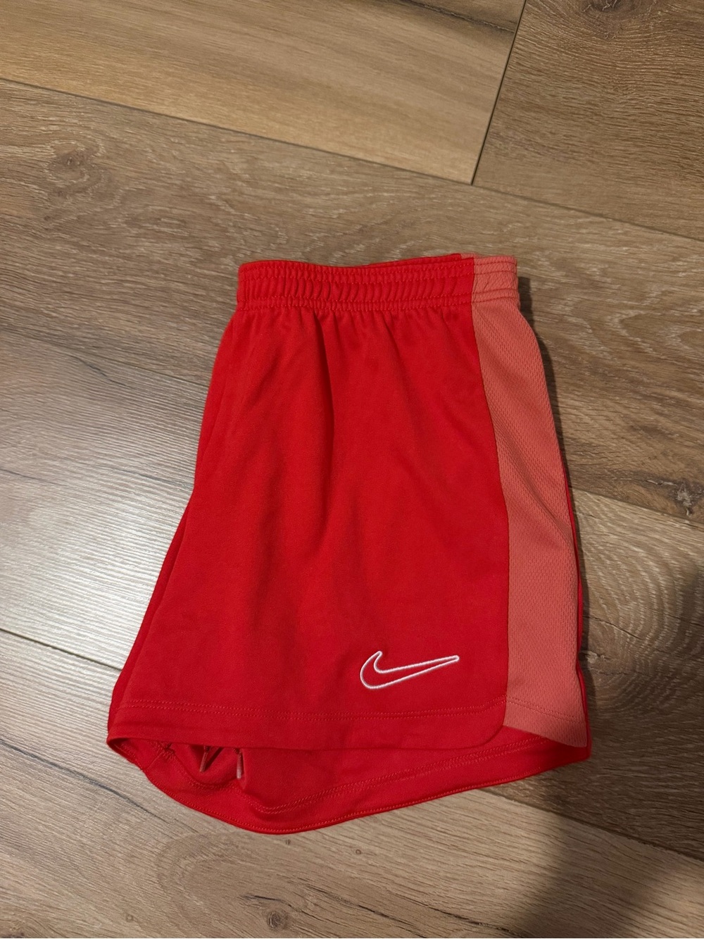 Nike Red Athletic Shorts with Coral Side Stripe